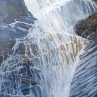 light cascading down shannon falls